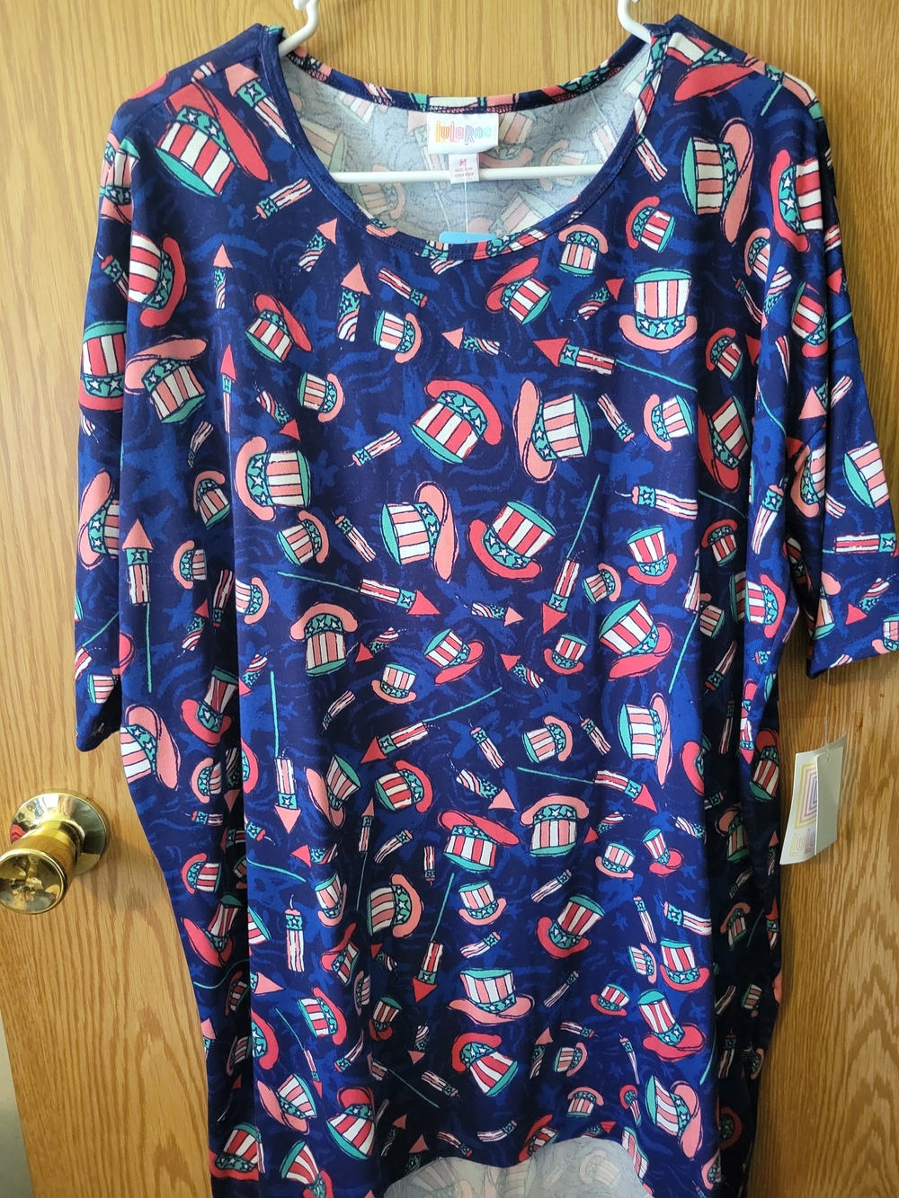 LuLaRoe Navy Top with Dark Blue, Red, Light Blue, and White Patriotic Hat Print